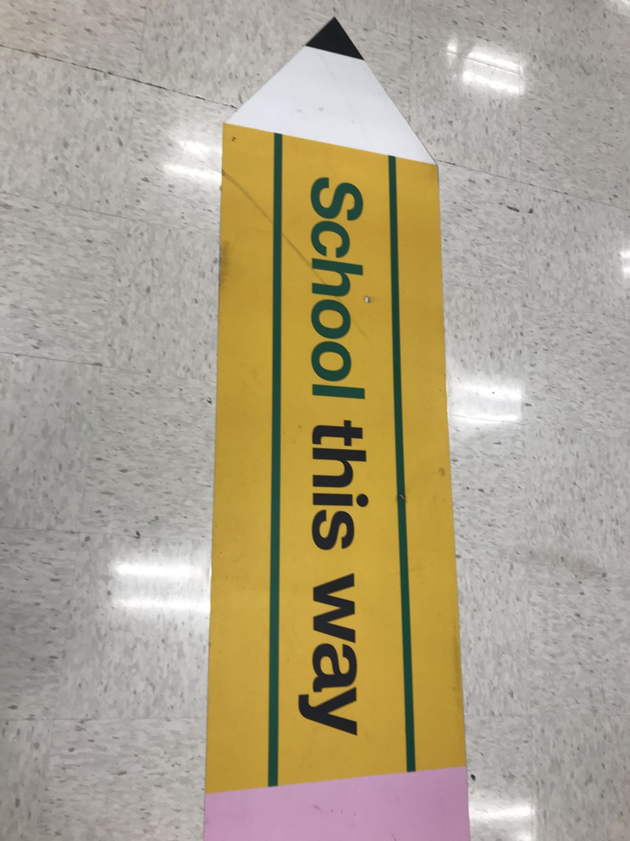 "School this way' sign on Target floor 2019